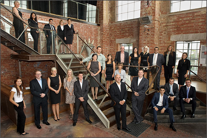 Group photograph of Compton Green employees in the entrance foyer of The Substation in Newport, Victoria.